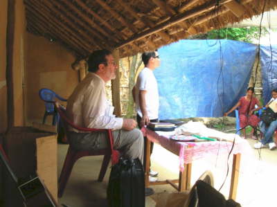 Henry Preaching in Remote Village