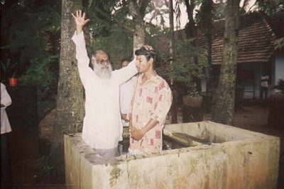 A STUDENT IS BAPTIZED